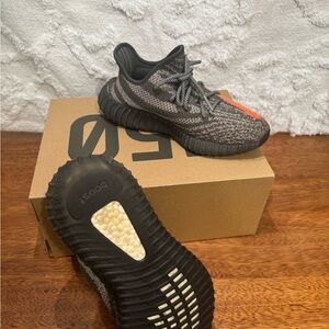 Kids Black and Orange Yezzy Sneakers